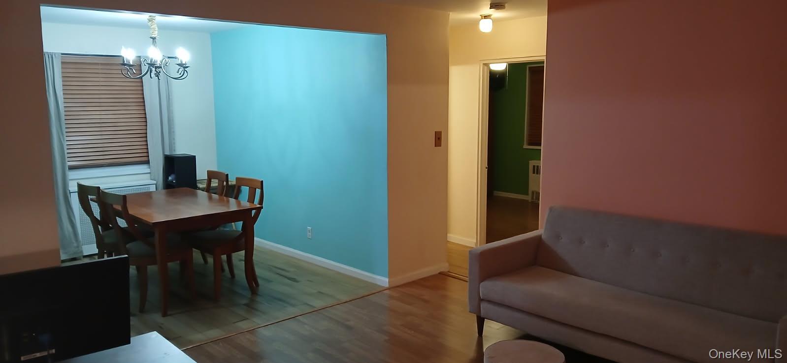 224-04 Manor Road, Unit 103 Queens, NY 11427 - Photo 14 of 28 a bathroom with a sink and a mirror