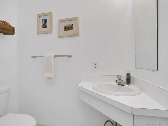 a bathroom with a sink and a toilet