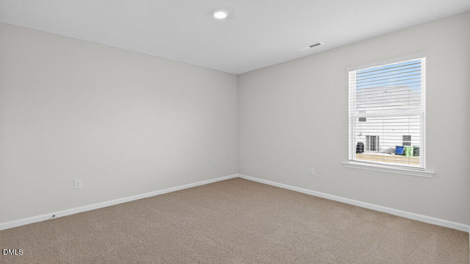 3613 Turney Drive Raleigh, NC 27610 - Photo 18 of 39 an empty room with a window