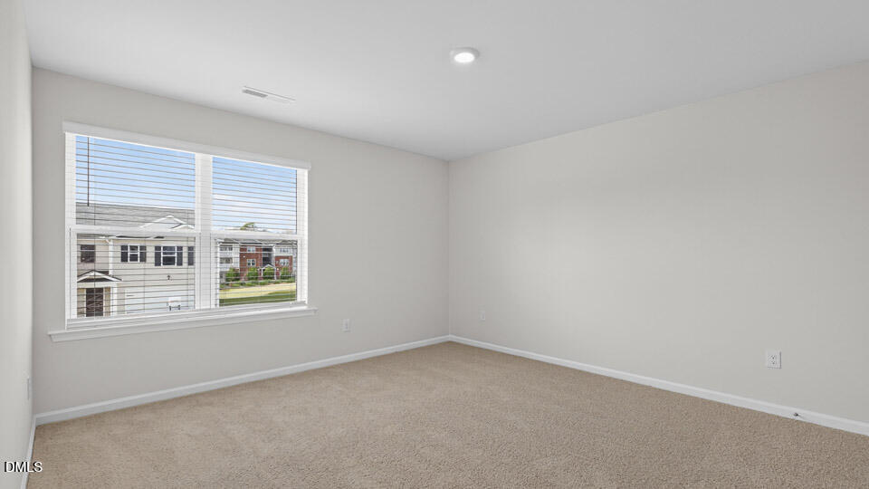 3613 Turney Drive Raleigh, NC 27610 - Photo 22 of 39 an empty room with a window