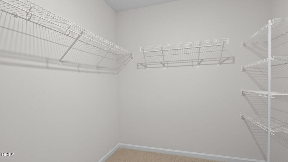 3613 Turney Drive Raleigh, NC 27610 - Photo 29 of 39 a view of a room with racks on the wall