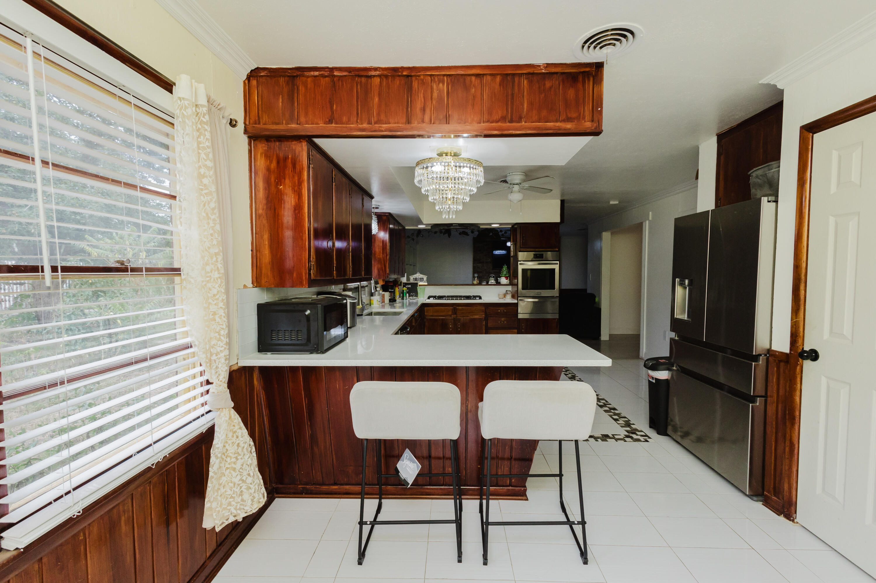 2110 57th Street Lubbock, TX 79412 - Photo 17 of 49 a dinning table and chairs in a kitchen