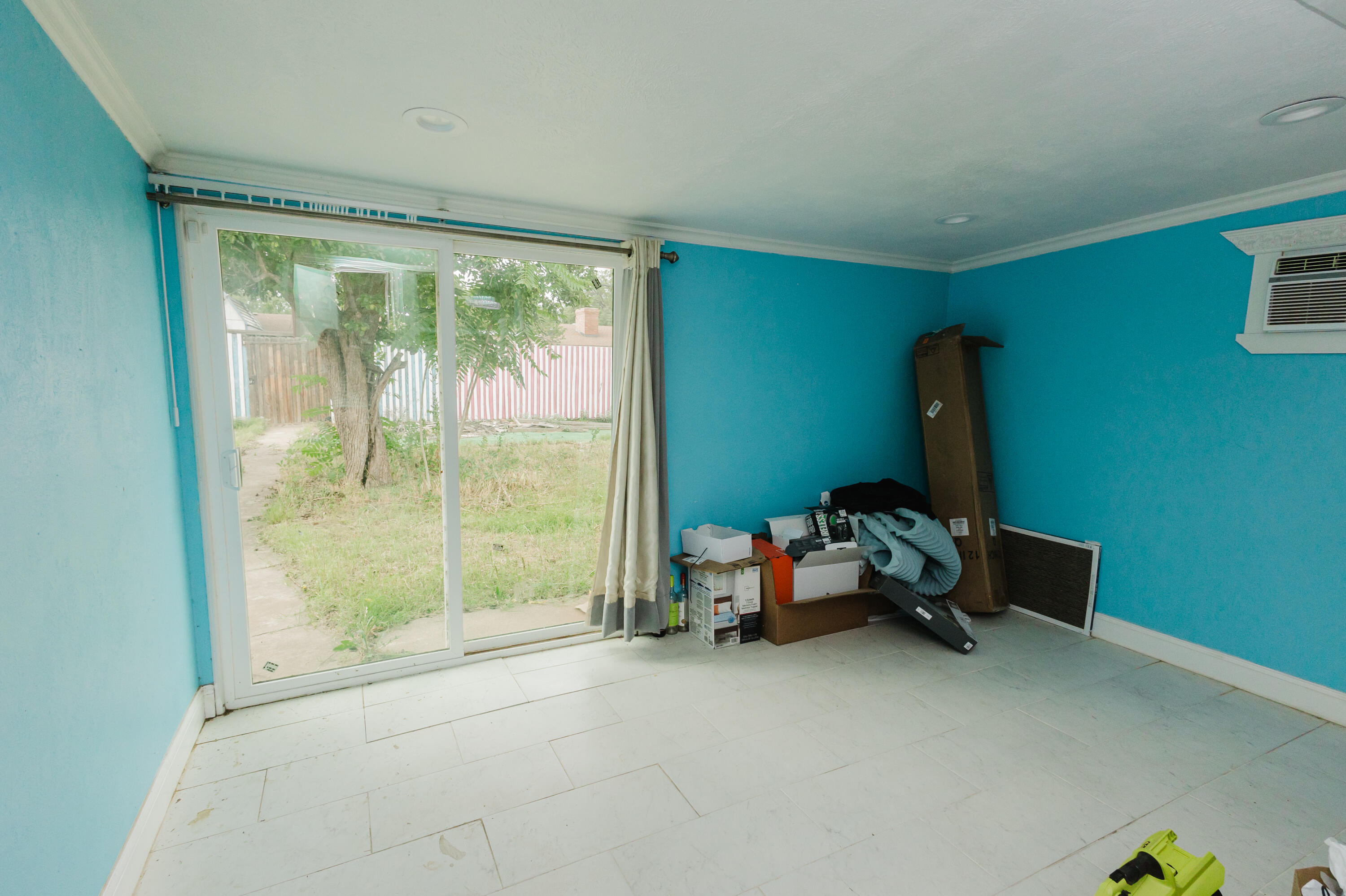 2110 57th Street Lubbock, TX 79412 - Photo 40 of 49 a bedroom with furniture and a large window