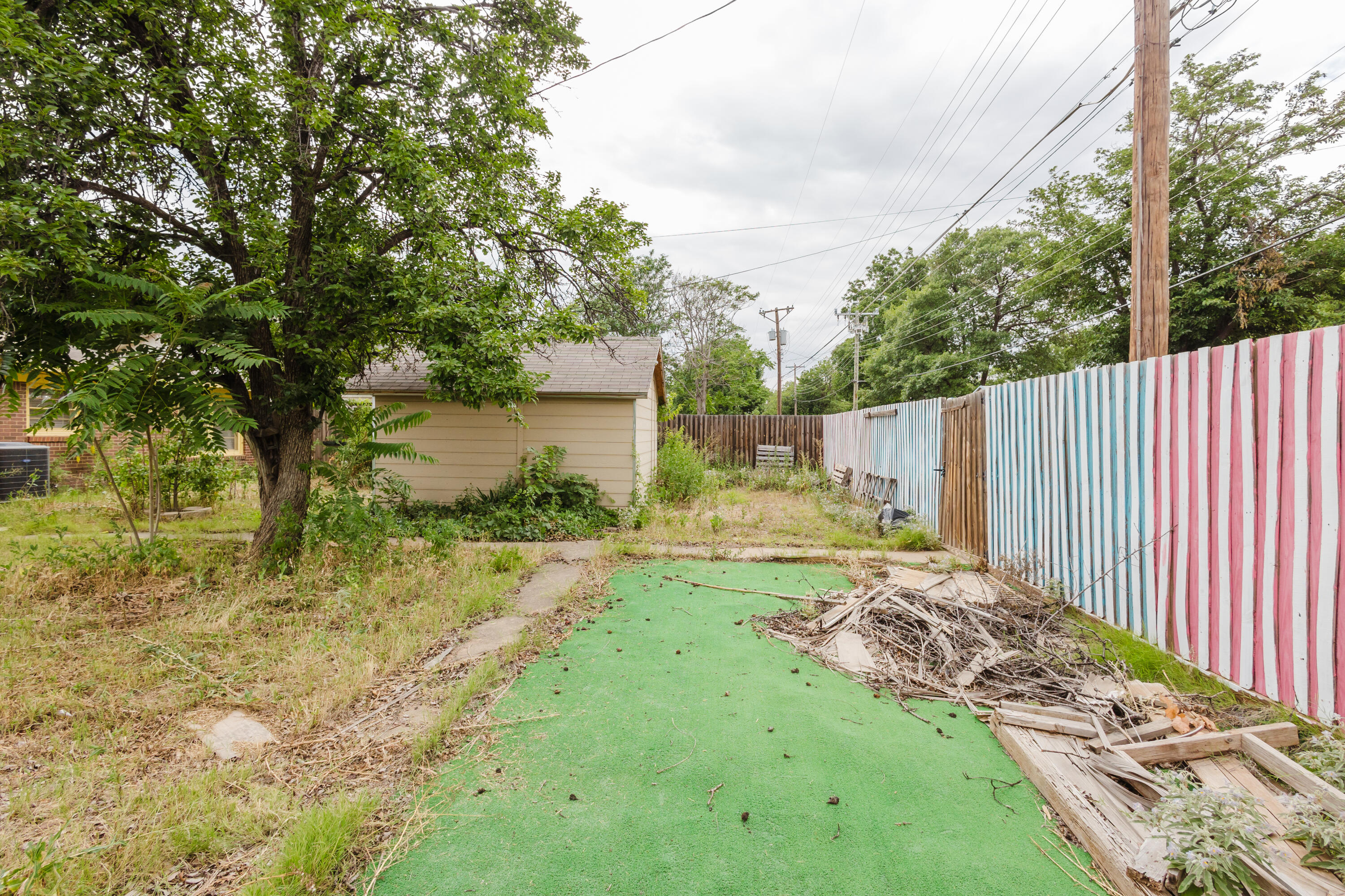 2110 57th Street Lubbock, TX 79412 - Photo 45 of 49 a view of backyard of house with green space