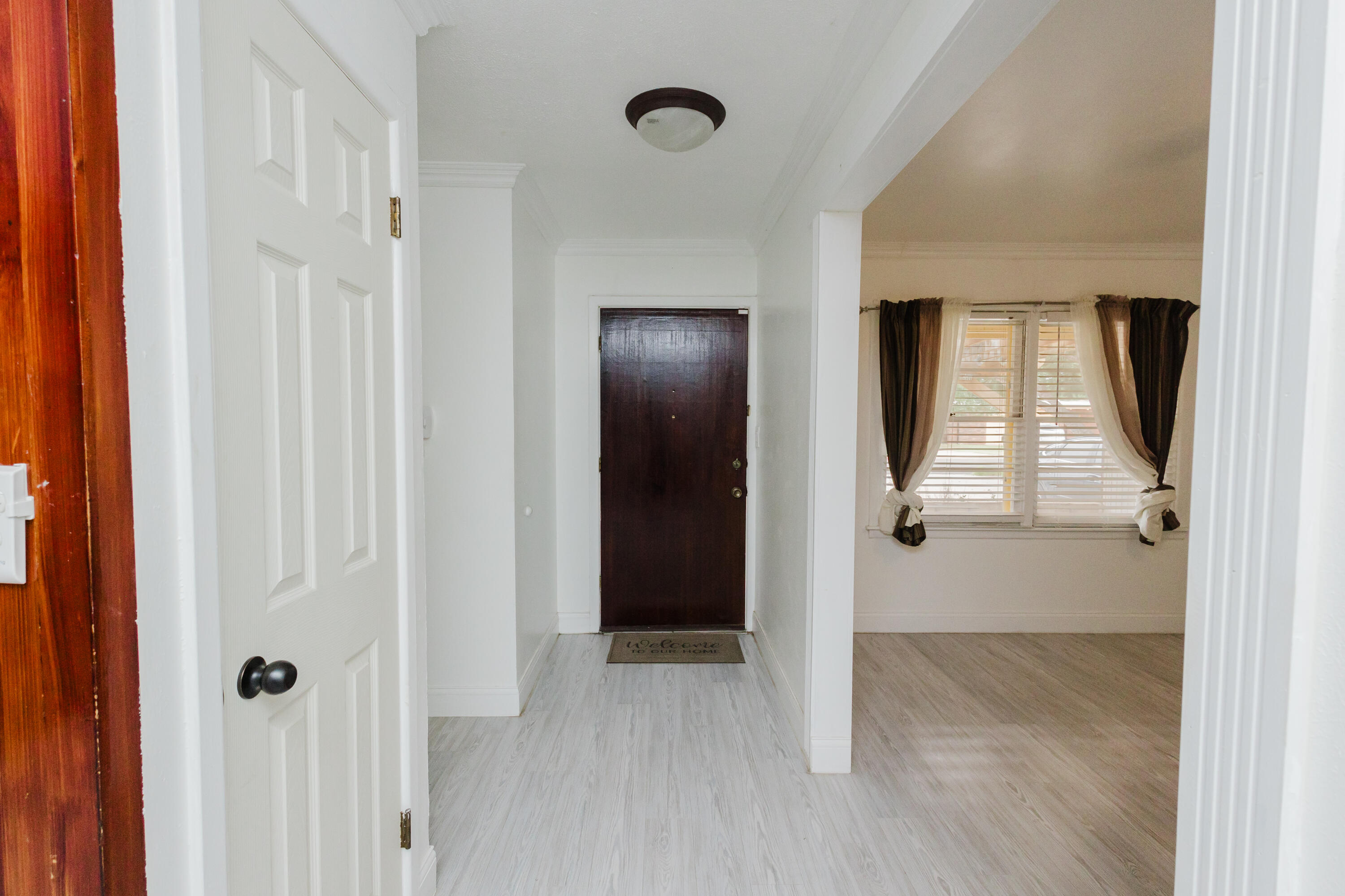 2110 57th Street Lubbock, TX 79412 - Photo 6 of 49 an empty room with windows and closet