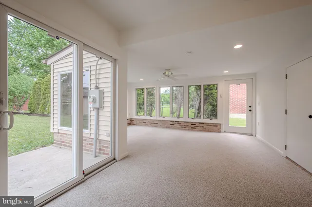 a view of an empty room with a balcony