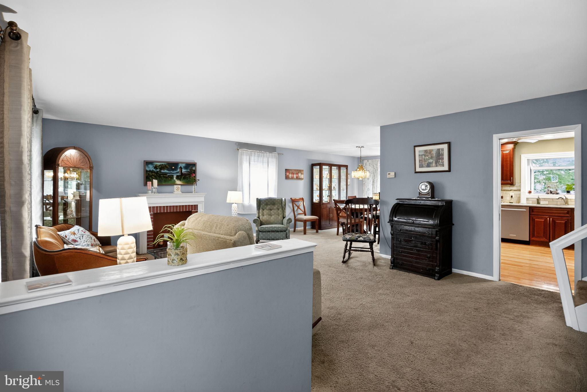 1009 Twist Road Philadelphia, PA 19115 - Photo 5 of 30 a living room with furniture and a flat screen tv