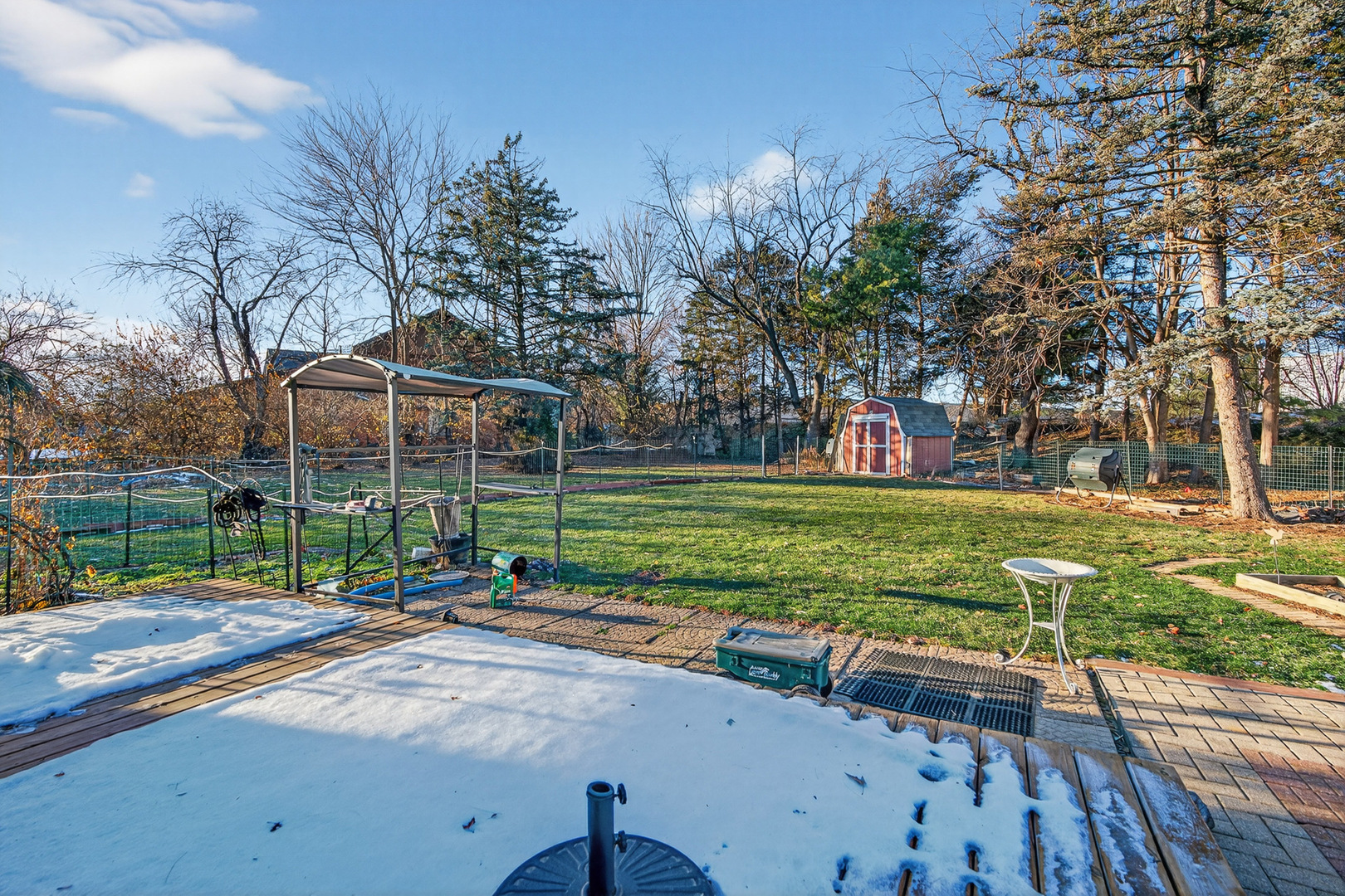 1790 Devonshire Court Elgin, IL 60123 - Photo 22 of 27 a view of a park with swings and slides