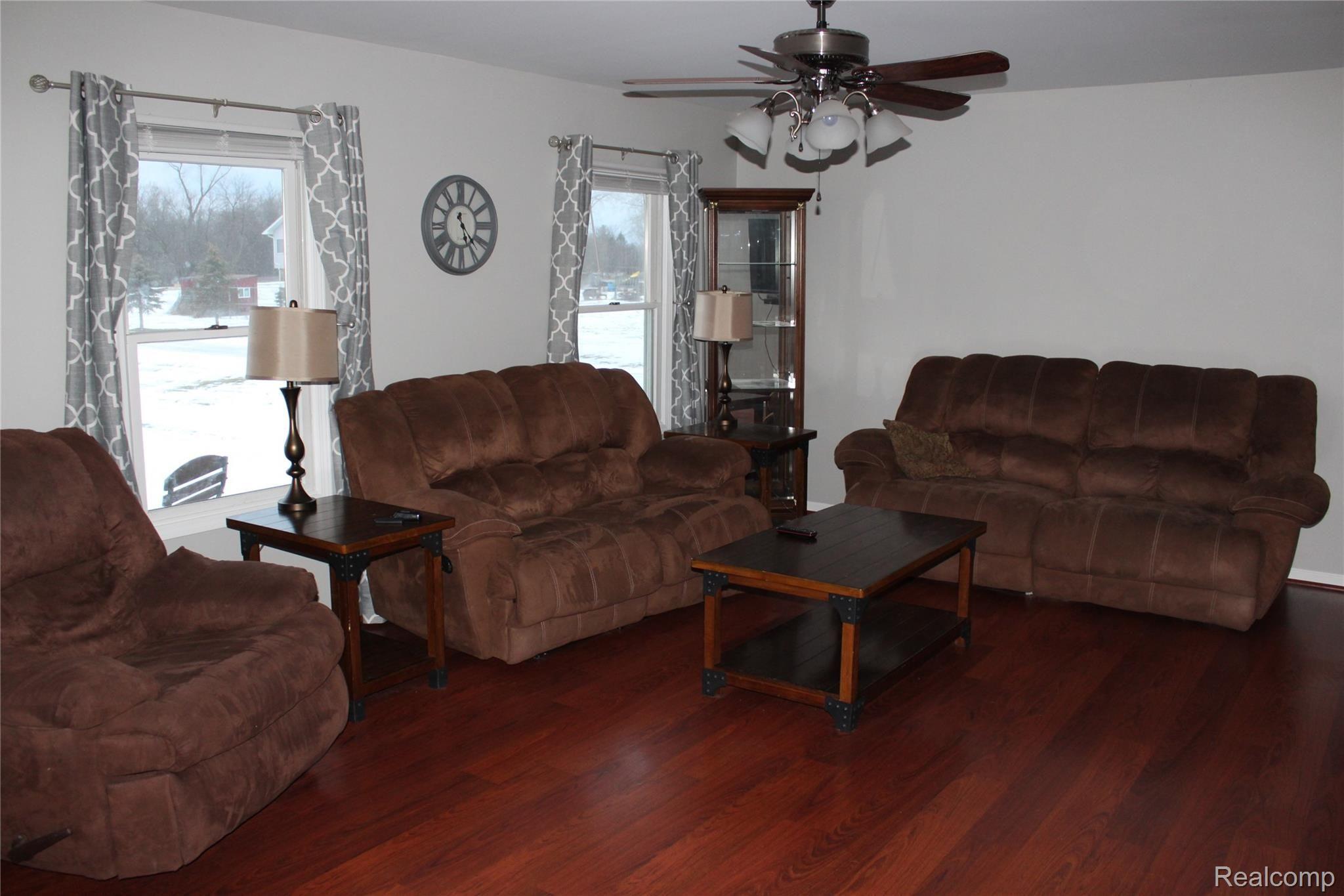 9127 Lambs Road Goodells, MI 48027 - Photo 6 of 11 Large living room over looking front yard