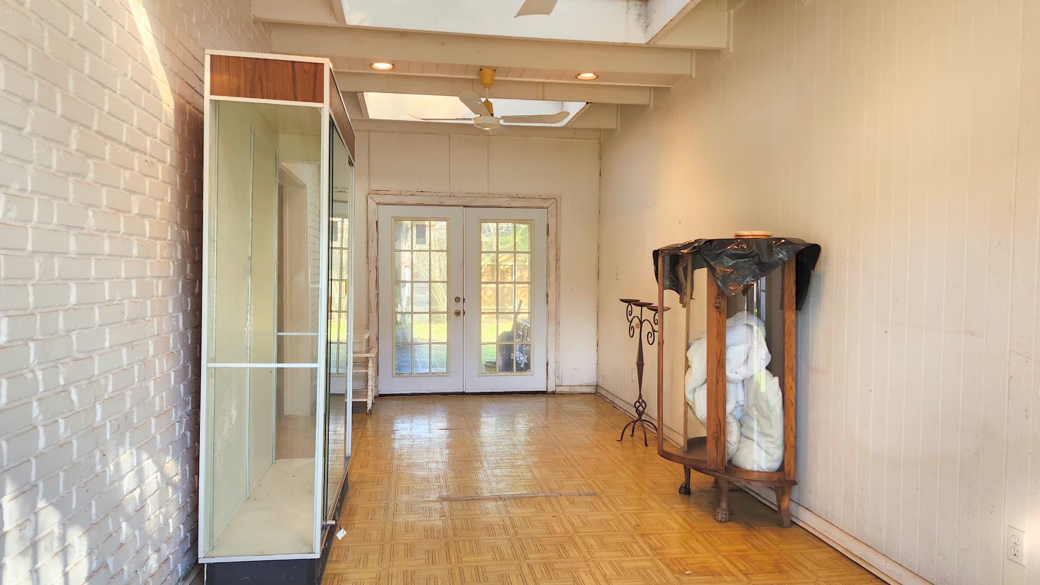 1927 Bethlehem Street Houston, TX 77018 - Photo 14 of 25 a view of a hallway with wooden floor and staircase
