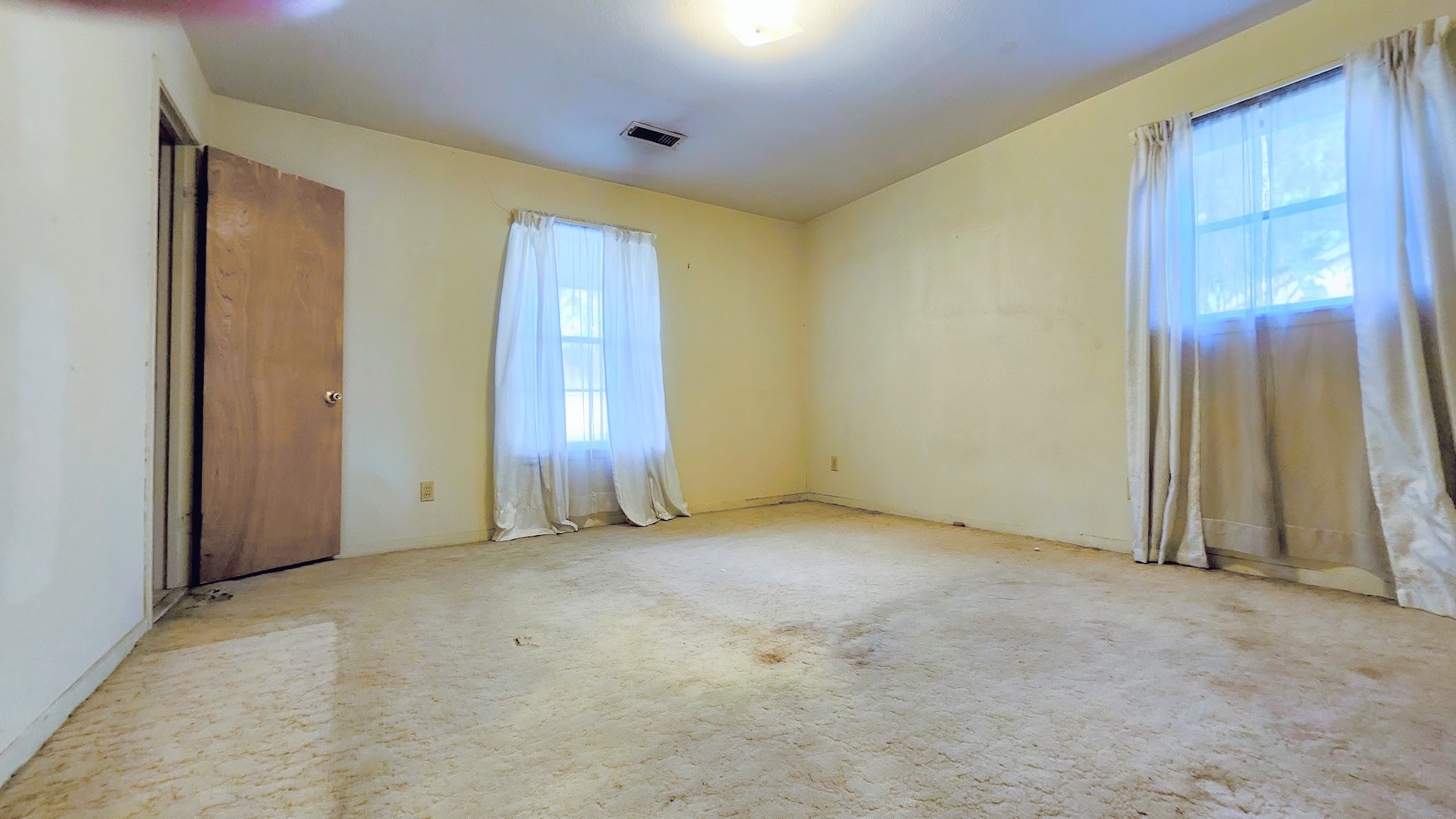 1927 Bethlehem Street Houston, TX 77018 - Photo 15 of 25 a view of an empty room with a window