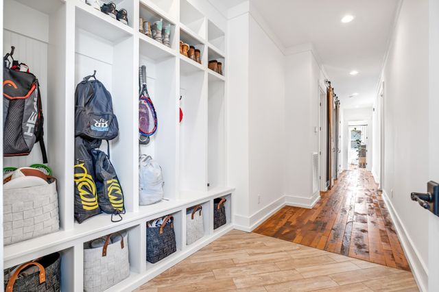 a view of an entryway with wooden floor