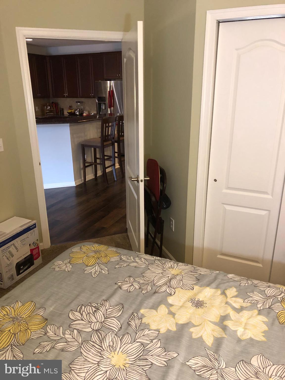 239 Carson Terrace, Unit 239 Huntingdon Valley, PA 19006 - Photo 15 of 19 a view of a livingroom with furniture and wooden floor