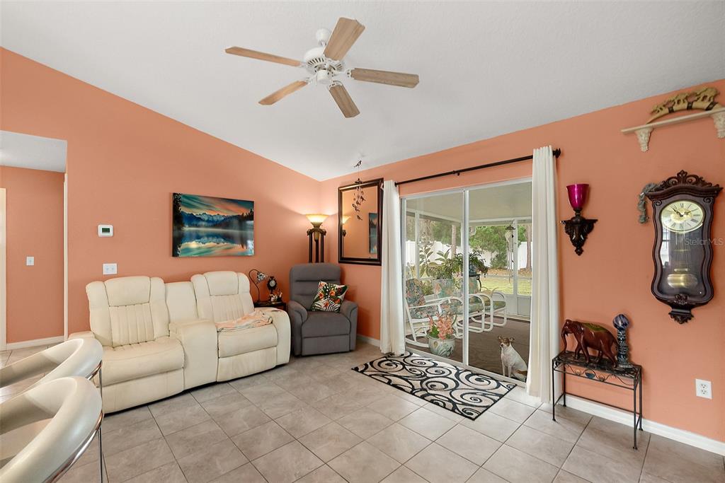 8 Karat Path Palm Coast, FL 32164 - Photo 7 of 37 a living room with furniture and a window