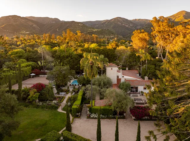 a view of a house with a garden