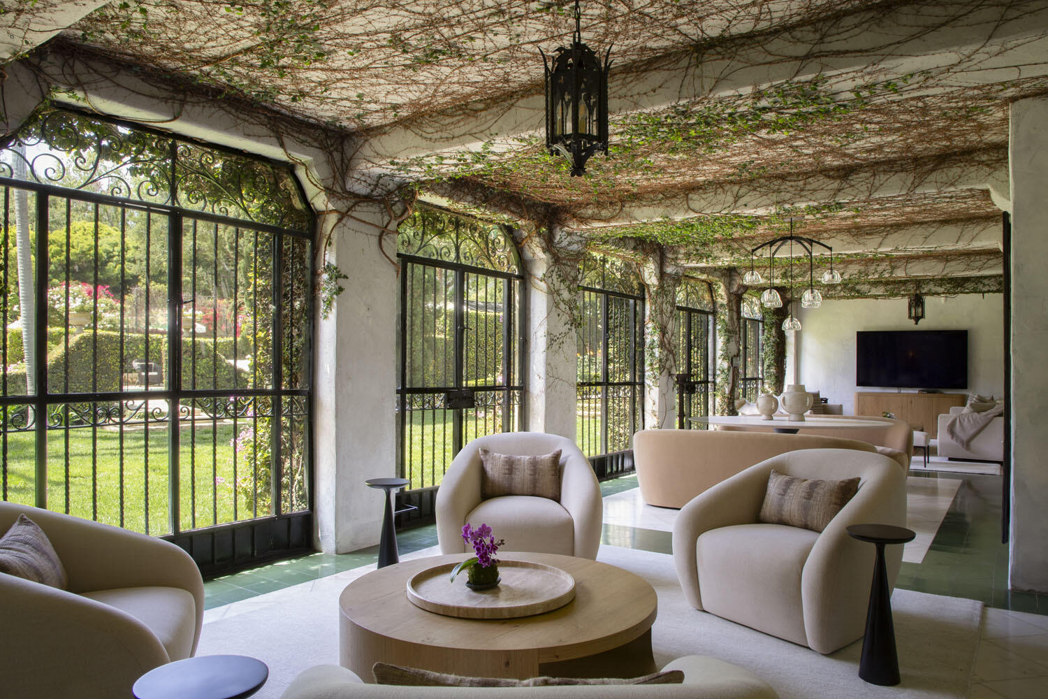 779 Ayala Lane Montecito, CA 93108 - Photo 24 of 58 a living room with furniture and a floor to ceiling window