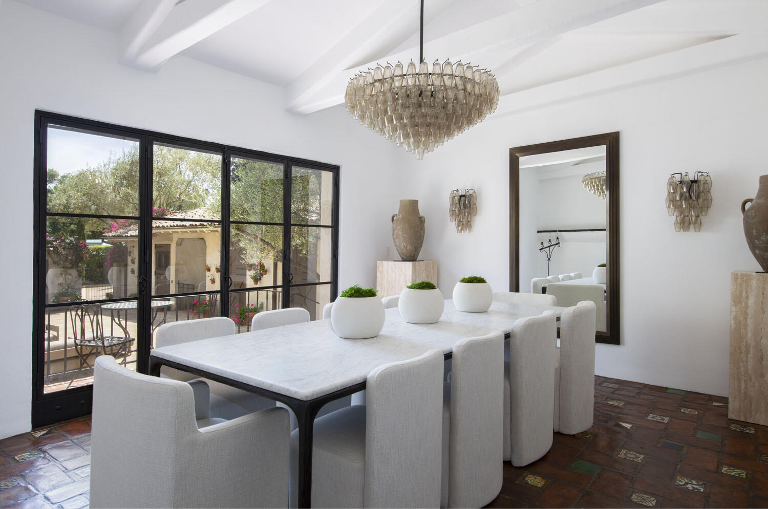 779 Ayala Lane Montecito, CA 93108 - Photo 29 of 58 a view of a dining room with furniture a chandelier and large window