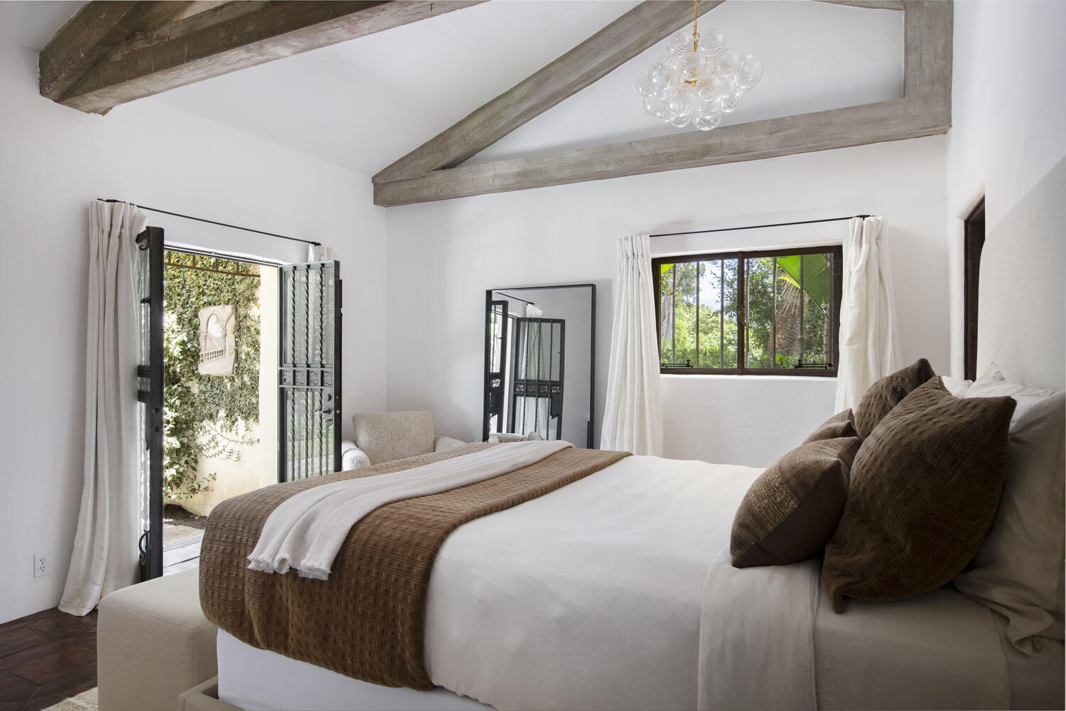 779 Ayala Lane Montecito, CA 93108 - Photo 38 of 58 a bedroom with a bed and a window