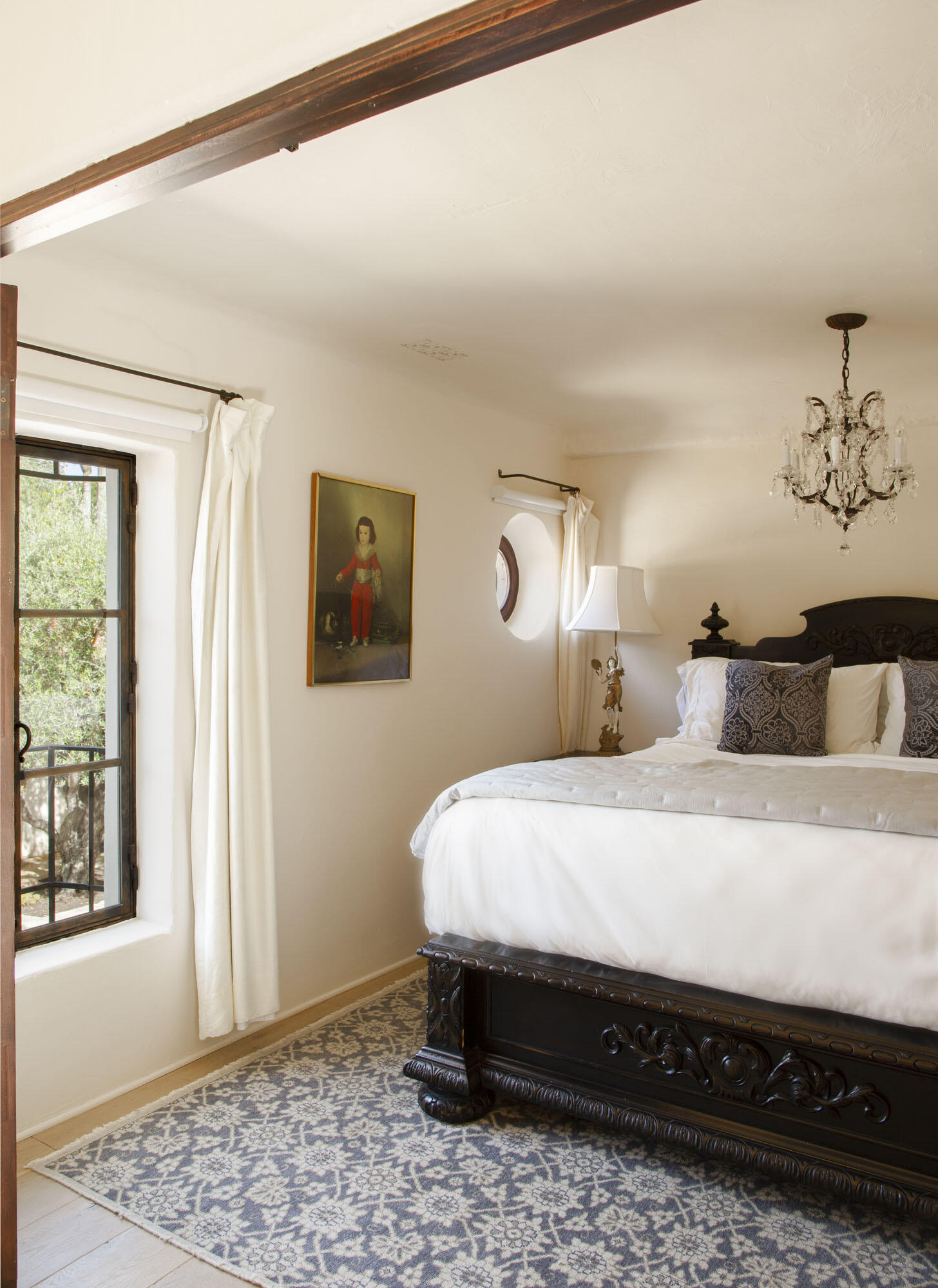 779 Ayala Lane Montecito, CA 93108 - Photo 41 of 58 a bedroom with a bed and wooden floor