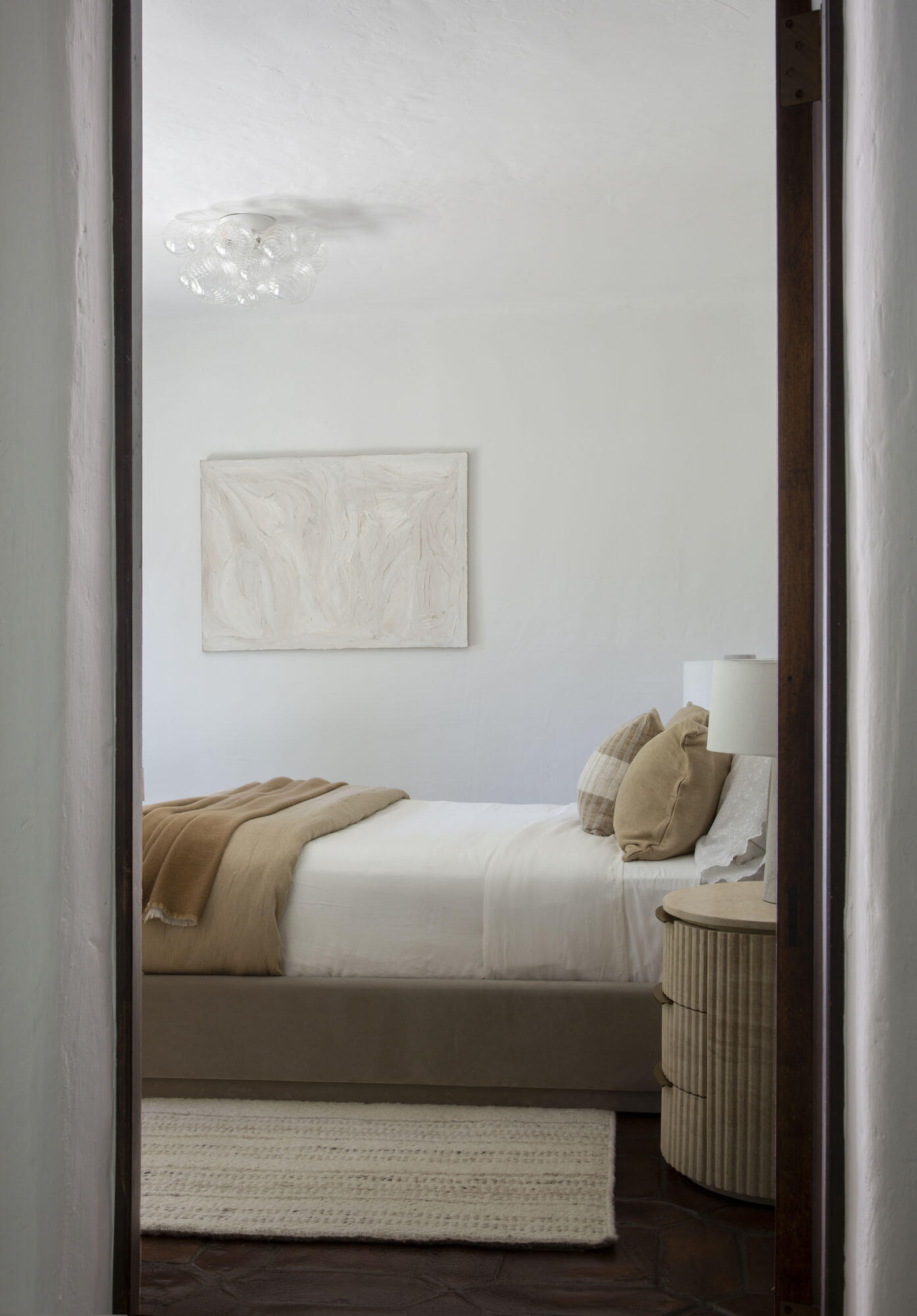 779 Ayala Lane Montecito, CA 93108 - Photo 43 of 58 a bedroom with a bed and dresser