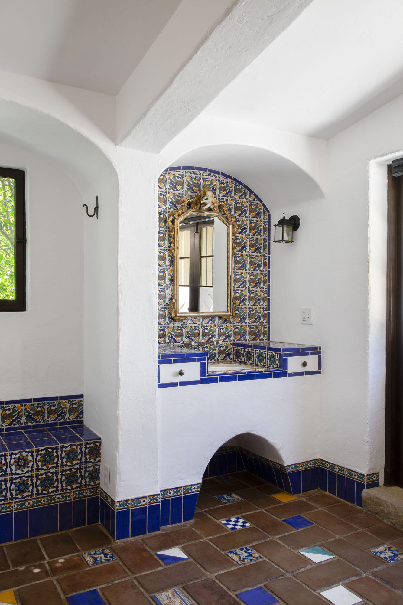 779 Ayala Lane Montecito, CA 93108 - Photo 48 of 58 a living room with a bed furniture and a potted plant