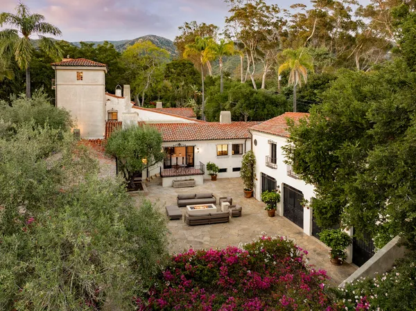 a view of a swimming pool with a yard
