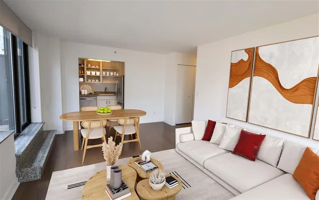 a reading room with furniture and wooden floor