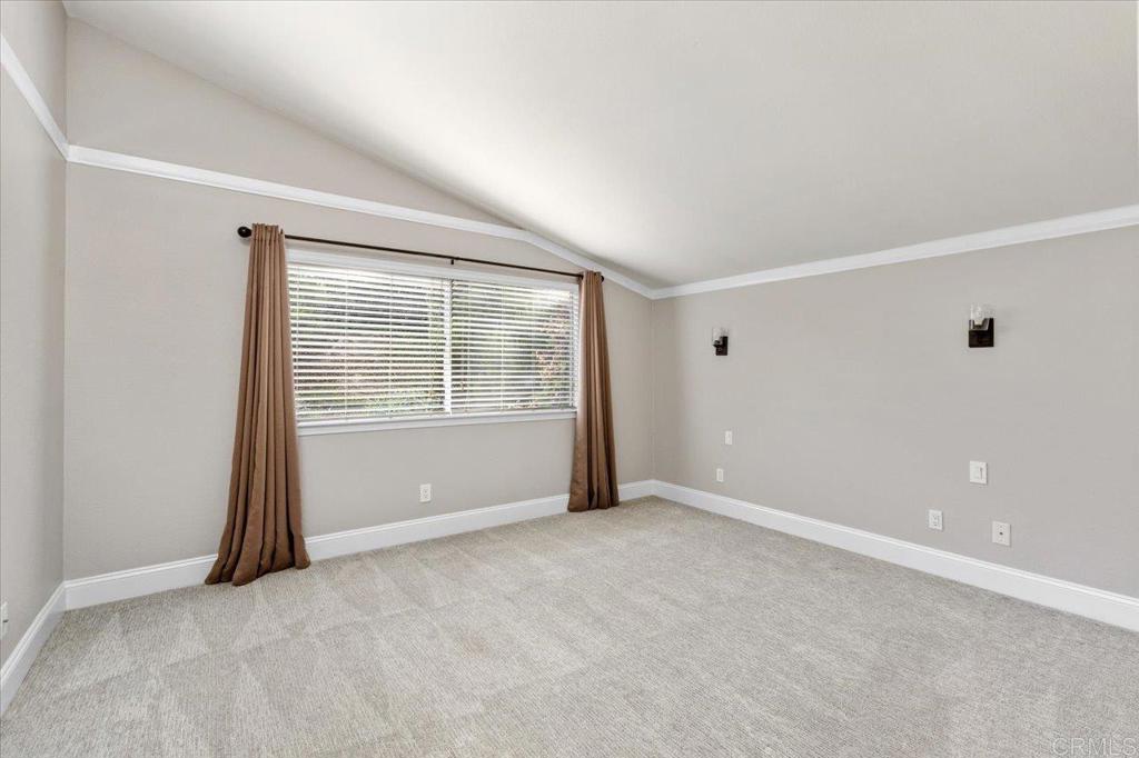 1533 Promontory Ridge Way Vista, CA 92081 - Photo 14 of 26 a view of an empty room with a window