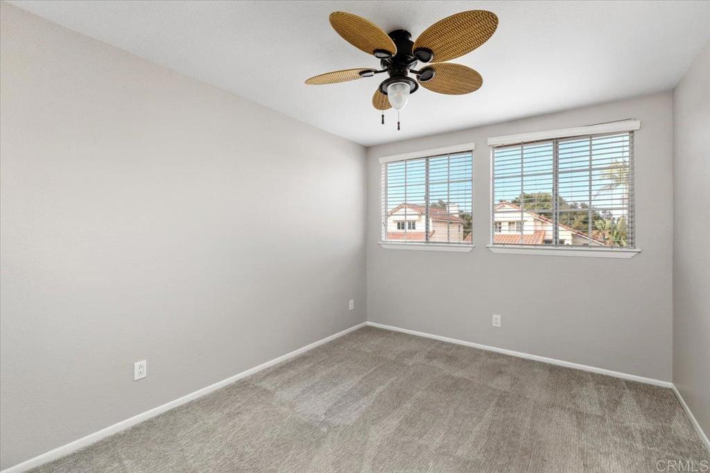 1533 Promontory Ridge Way Vista, CA 92081 - Photo 16 of 26 an empty room with a window