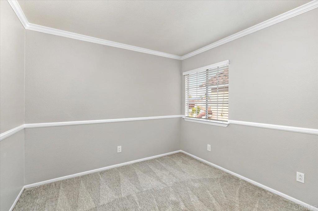 1533 Promontory Ridge Way Vista, CA 92081 - Photo 18 of 26 a view of an empty room with a window