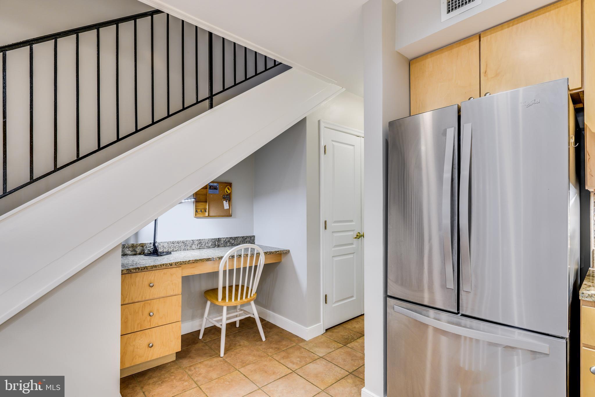 616 E Street Northwest, Unit 446 Washington, DC 20004 - Photo 7 of 66 a kitchen with stainless steel appliances a refrigerator and cabinets