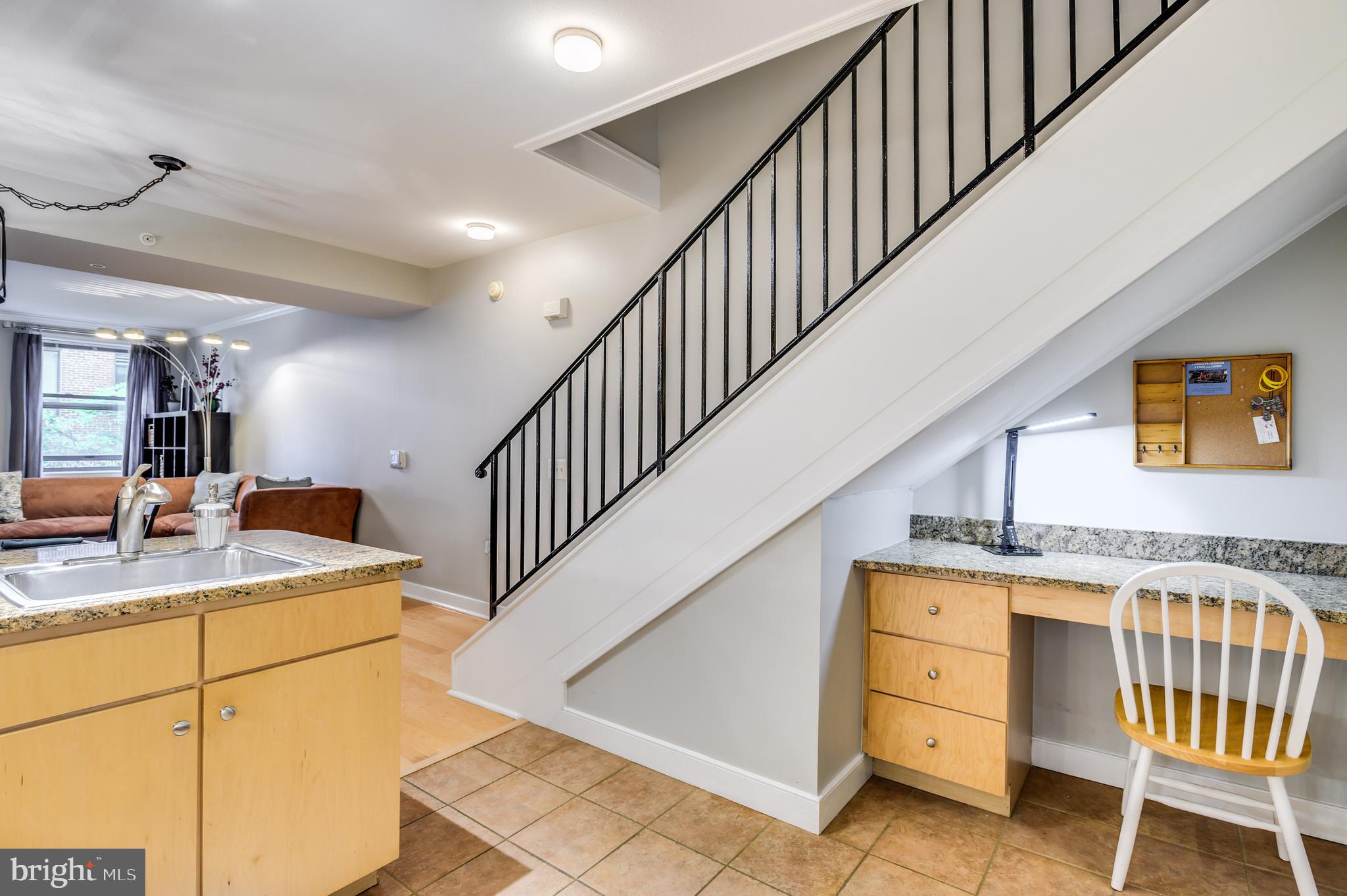 616 E Street Northwest, Unit 446 Washington, DC 20004 - Photo 8 of 66 a view of a hallway with kitchen