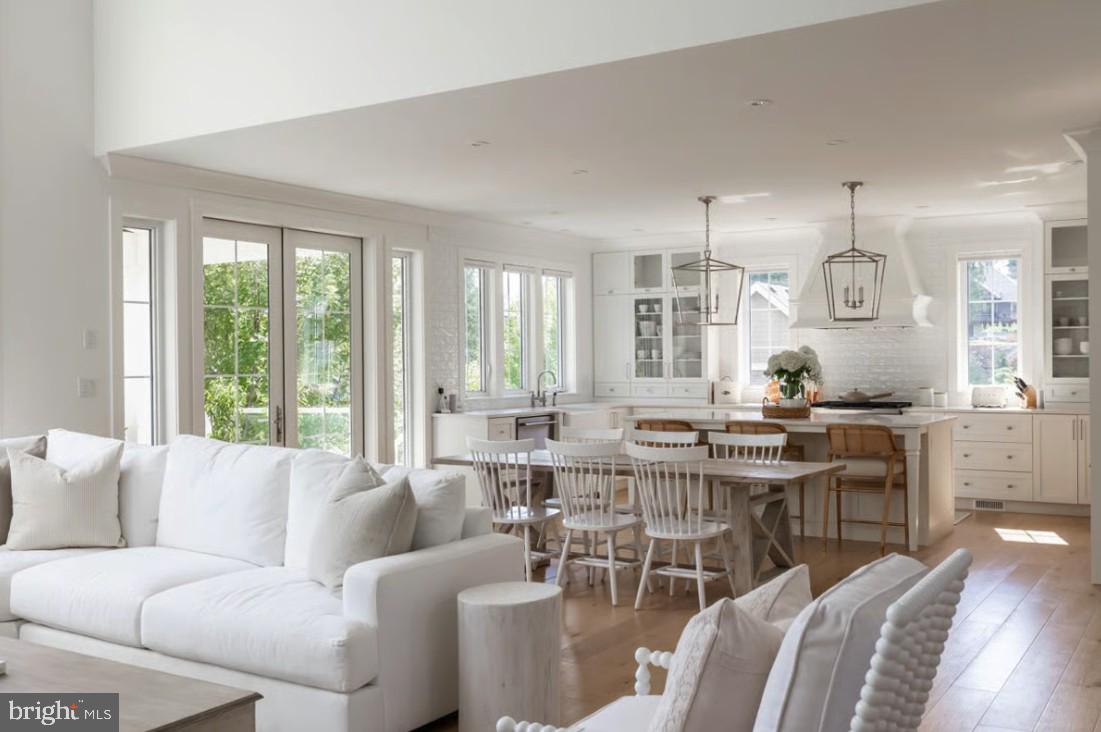 11825 B Garrison Forest Road Owings Mills, MD 21117 - Photo 4 of 12 a living room with furniture kitchen and a large window