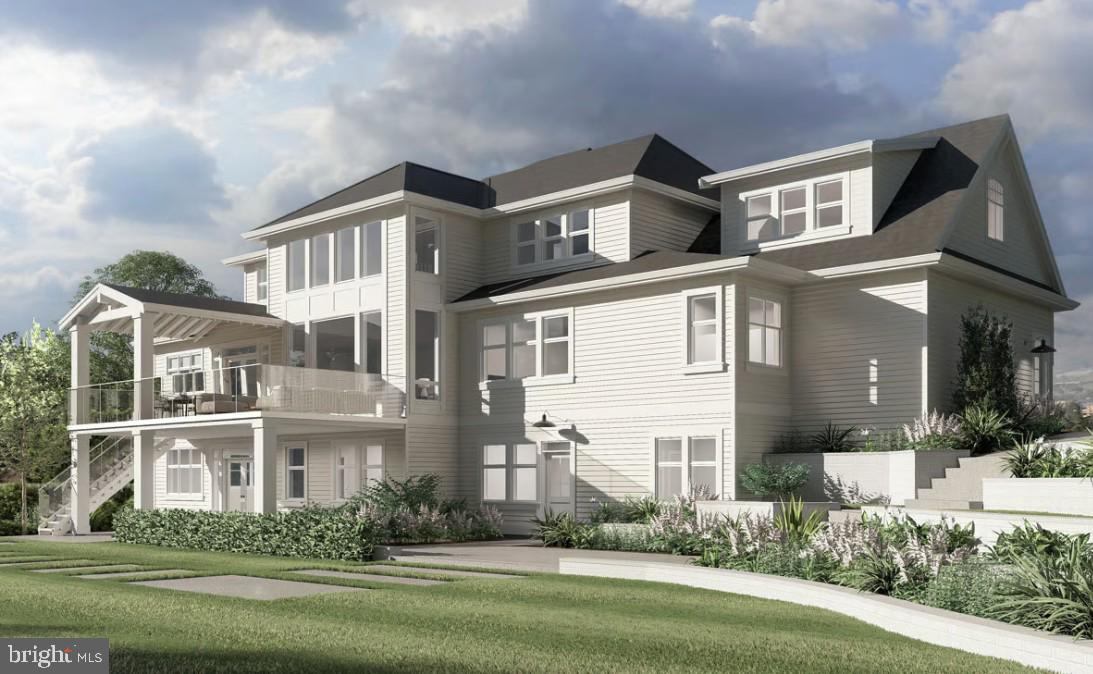 11825 B Garrison Forest Road Owings Mills, MD 21117 - Photo 10 of 12 a front view of a house with a yard