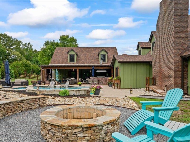 8104 Jack Bond Road Arlington, TN 38002 - Photo 33 of 40 a front view of house with outdoor seating