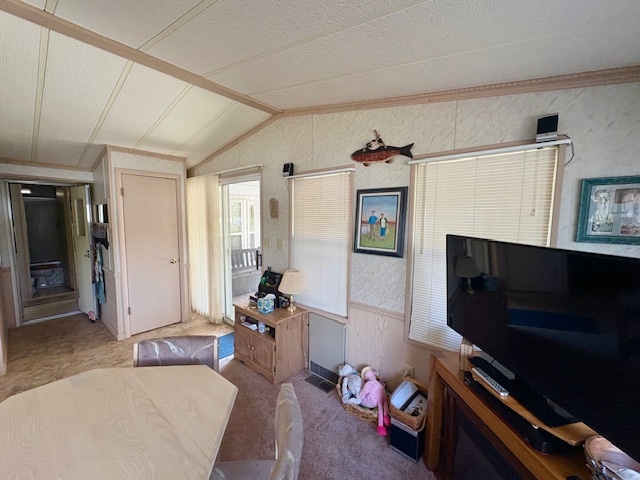 4-3&4 Woodhaven Sublette, IL 61367 - Photo 18 of 33 a living room with furniture and a flat screen tv