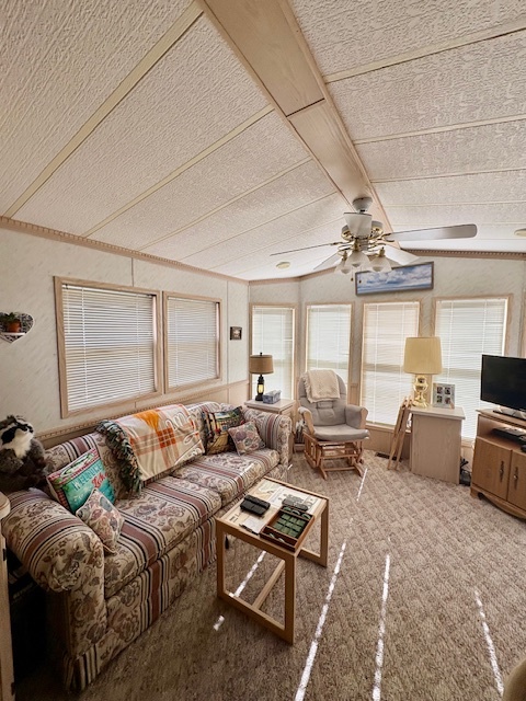 4-3&4 Woodhaven Sublette, IL 61367 - Photo 24 of 33 a living room with furniture and a chandelier