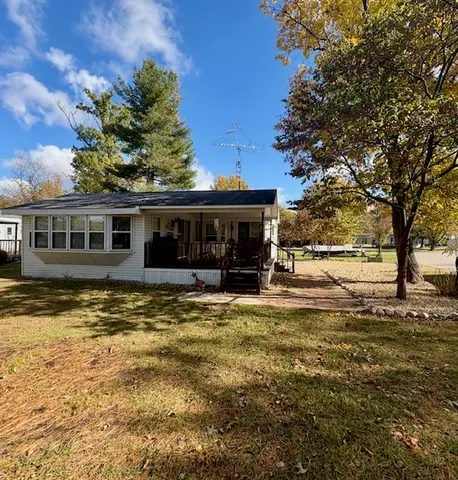 a view of a house with a swimming pool
