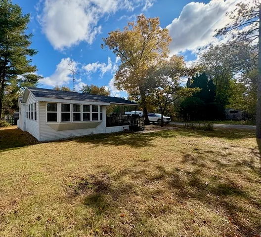 a view of a house with swimming pool