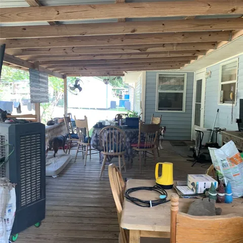 a view of a dining tables and chairs in the patio