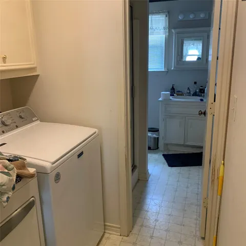 a view of a door and a window