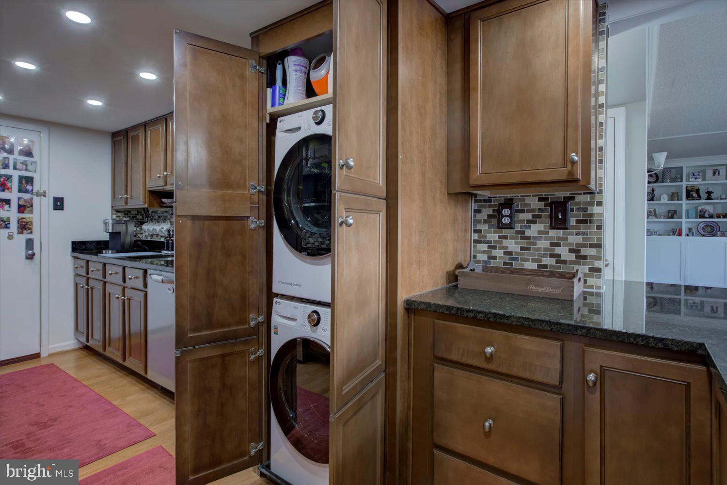 1515 South Arlington Ridge Road, Unit 305 Arlington, VA 22202 - Photo 12 of 41 a view of a kitchen with washer and dryer