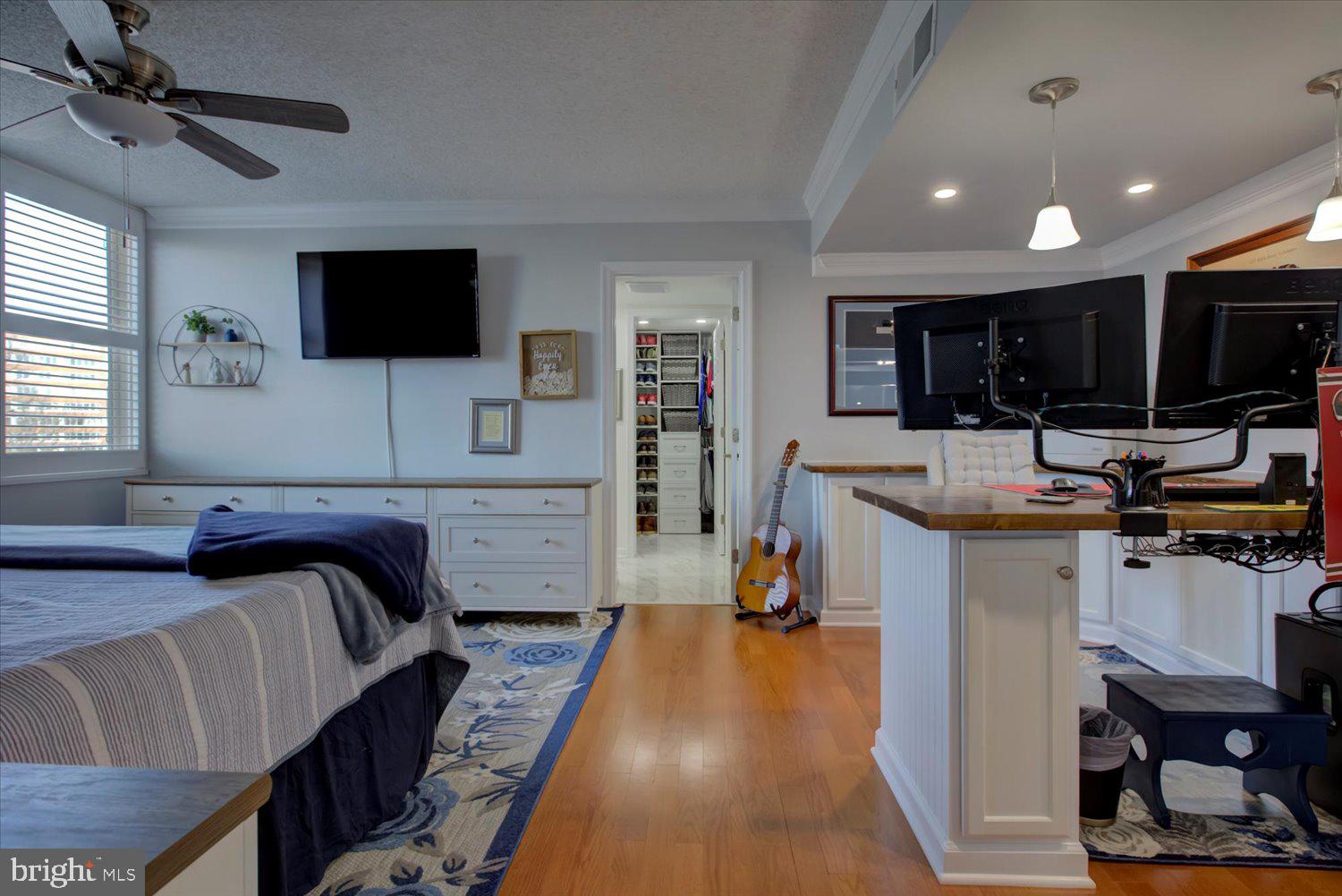 1515 South Arlington Ridge Road, Unit 305 Arlington, VA 22202 - Photo 16 of 41 a view of a livingroom with furniture and a flat screen tv