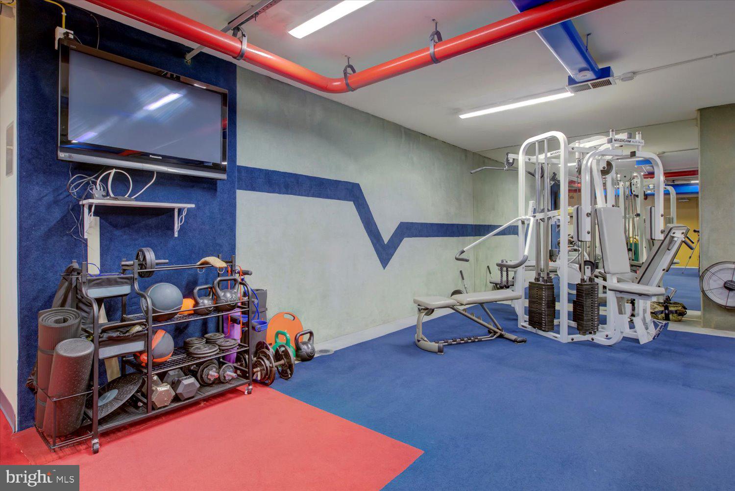 1515 South Arlington Ridge Road, Unit 305 Arlington, VA 22202 - Photo 38 of 41 a view of a room with gym equipment
