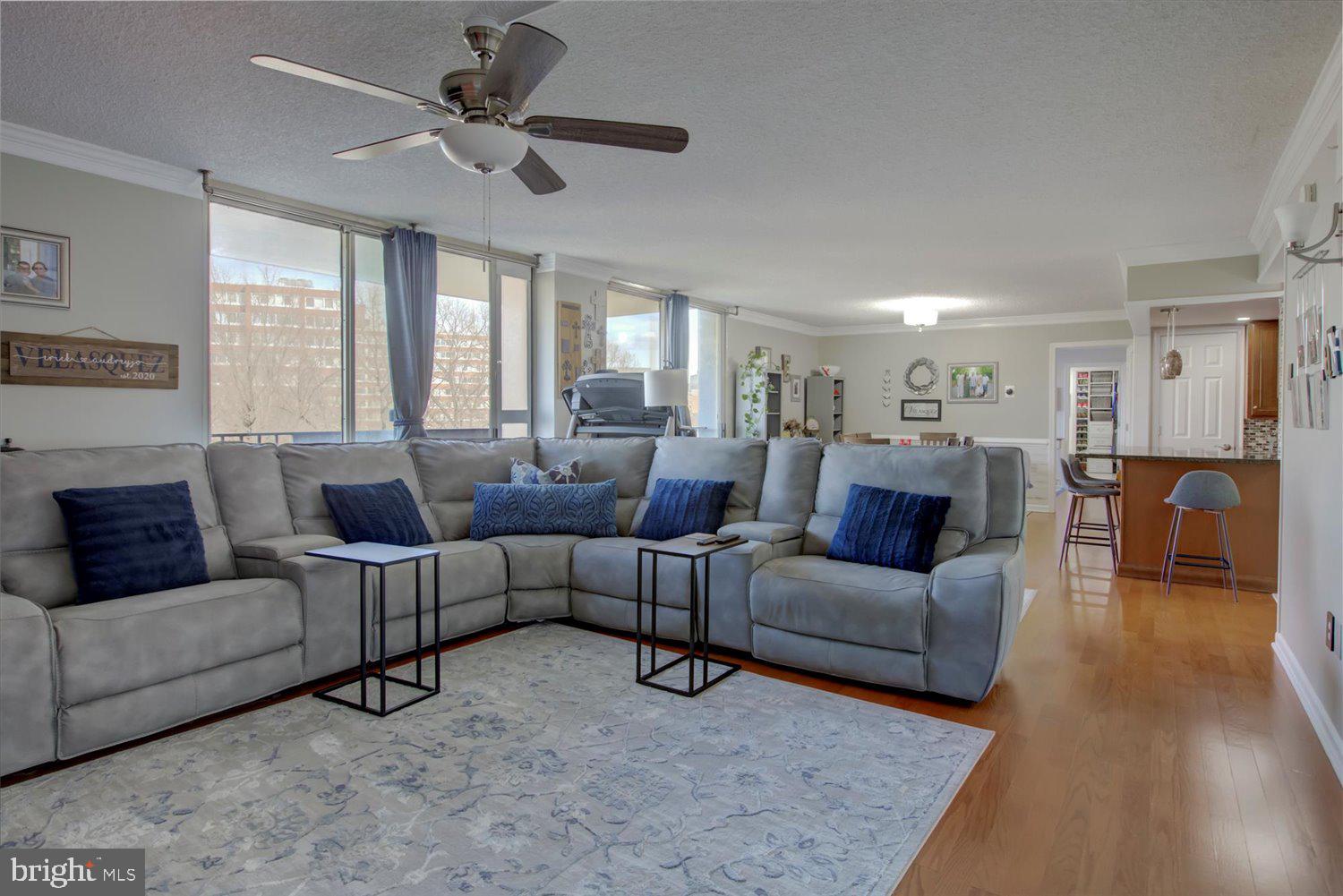 1515 South Arlington Ridge Road, Unit 305 Arlington, VA 22202 - Photo 5 of 41 a living room with furniture and a large window