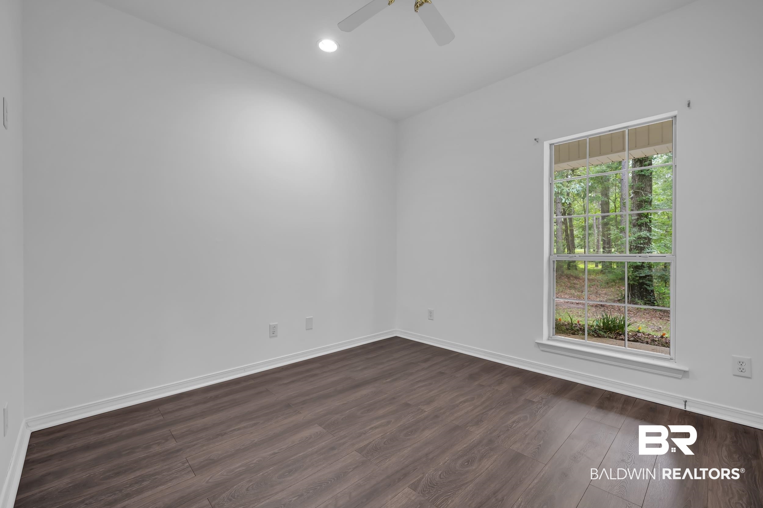 14960 Howells Ferry Road Wilmer, AL 36587 - Photo 15 of 22 Bedroom featuring wood-finish flooring, a ceiling fan, recessed lighting, and a large window with exterior views