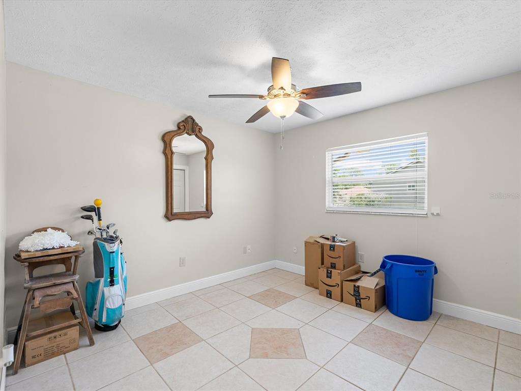 5904 Springrun Court Holiday, FL 34690 - Photo 33 of 53 a view of workspace with lounge chair