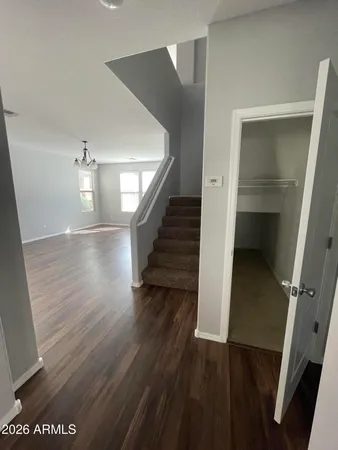 a view of entryway with wooden floor