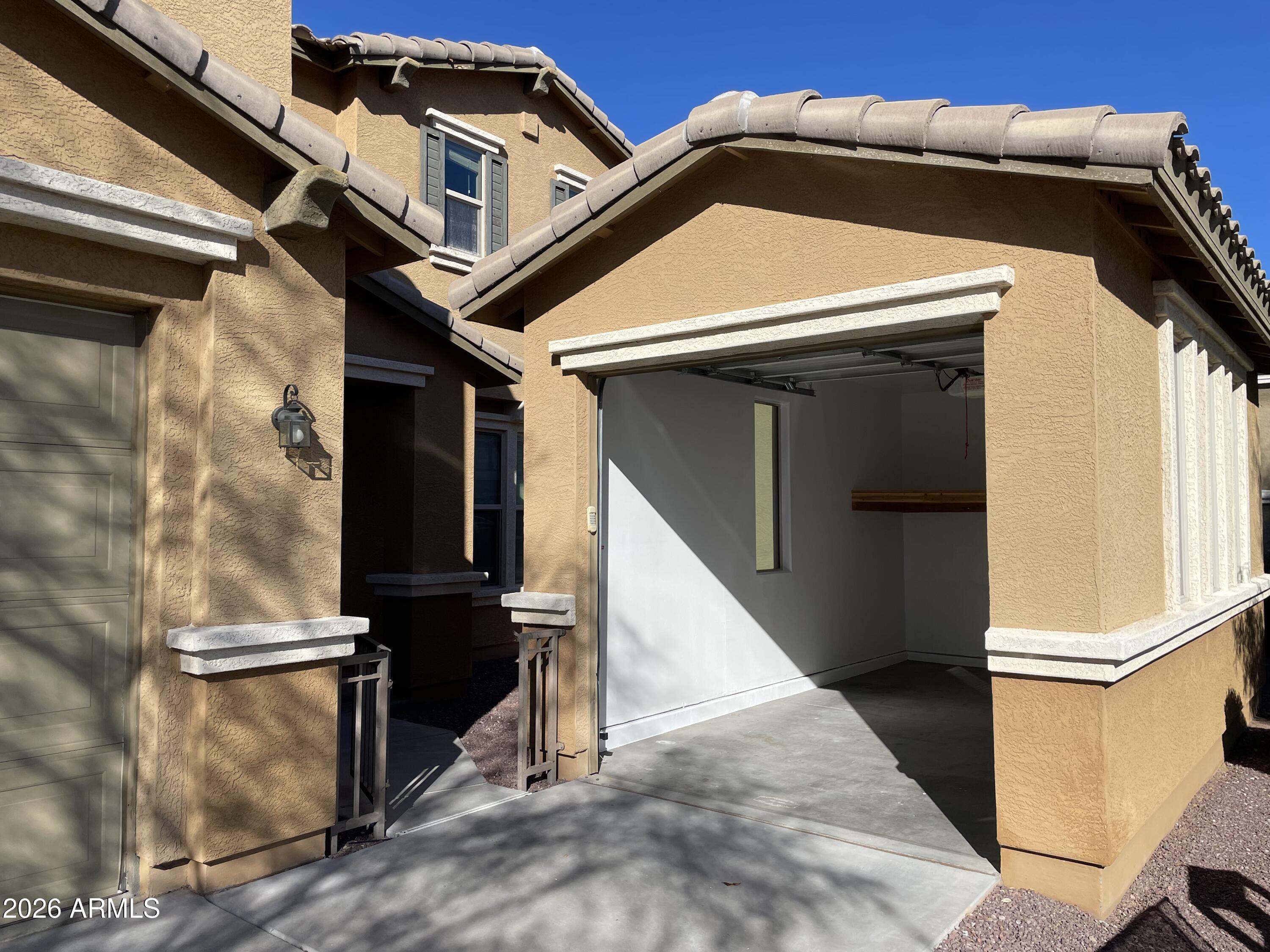 3448 East Merrill Avenue Gilbert, AZ 85234 - Photo 6 of 26 a view of an entryway of the house