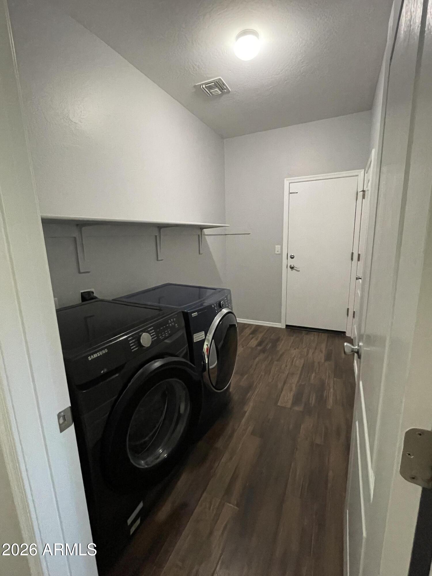 3448 East Merrill Avenue Gilbert, AZ 85234 - Photo 7 of 26 a utility room with dryer and washer